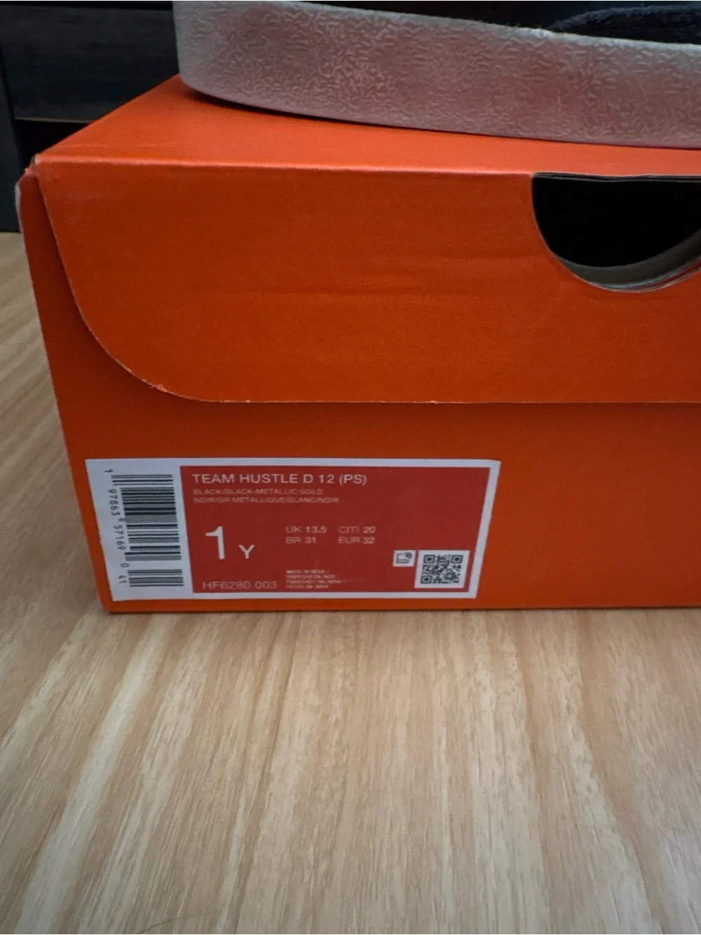 Nike Kids Black High-Top Sneakers with White Swoosh